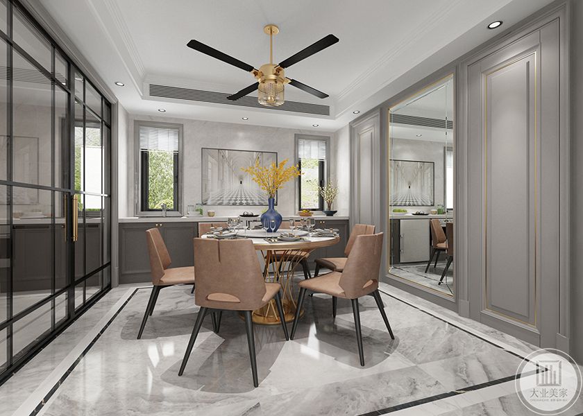 客厅整体使用了高级灰的色调，配上一些金属元素的点缀。与客厅通透性强，与厨房的连通性和交互性也非常好