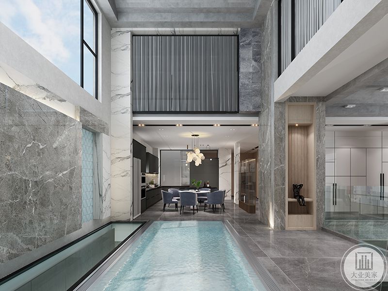 一楼泳池、与餐厅相隔，四周墙面用灰白色大理石砖铺贴，尽显空间的整洁明亮光感。现代轻奢风格效果图
