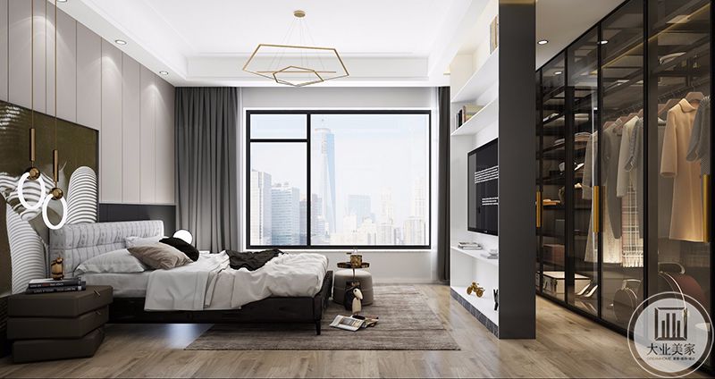 客房的色彩搭配也以更为稳重的灰色为主色调，衣帽间于卧室仅以一墙之隔，营造通透、大气的空间氛围。