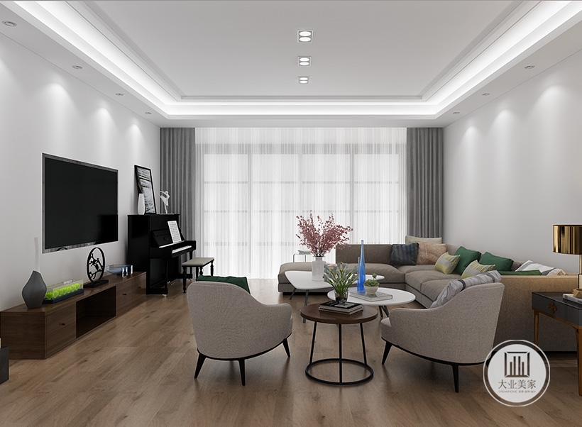 整体空间摒弃过多的装饰，客厅大面积的白色墙面搭配富有现代感的时尚家具，使整个空间看起来干练、明亮。
