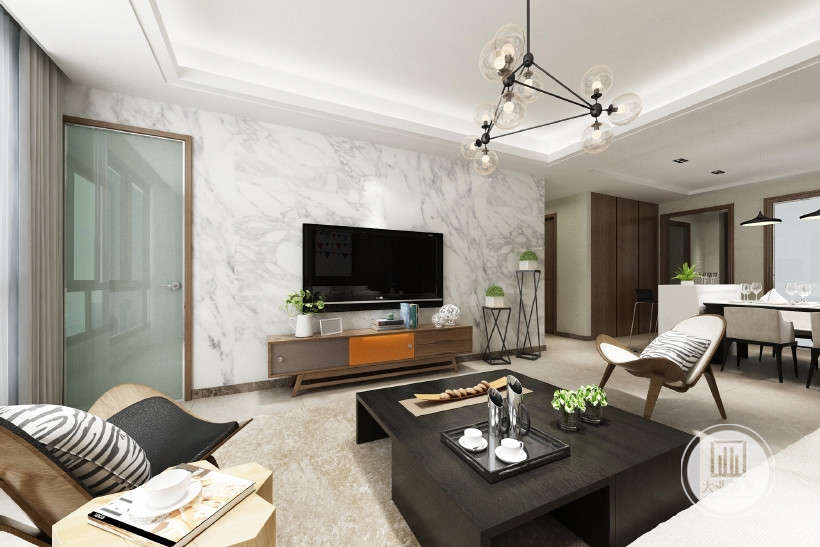 客厅整个墙面铺贴石材作电视背景墙，空间更加明亮大气，与灰色家具搭配简洁舒适。