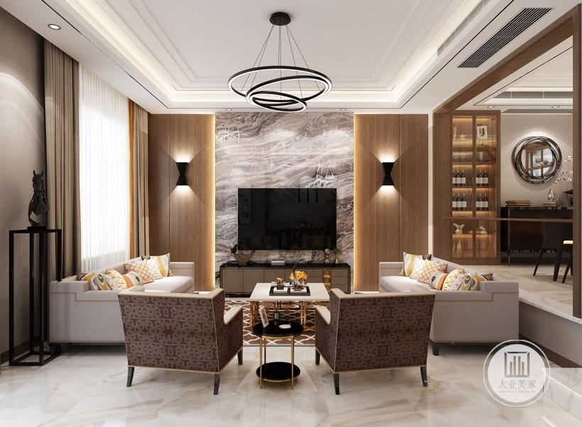 客厅主要以咖啡色为主调，配以浅灰色墙面，给人一种静谧又高贵的氛围。