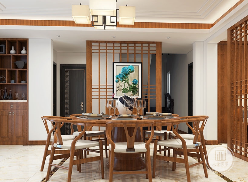 餐厅用了中式餐桌椅，背后设计了屏风包含中国色彩，屏风上的现代装饰画相结合，突出新中式风格的同时，让餐厅不那么严肃，多了一分温馨